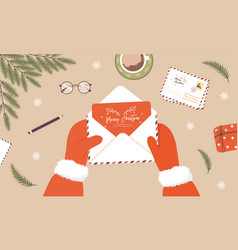 Santa Claus Hands Holding Envelope Sending