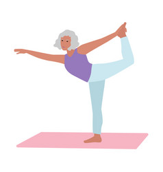 Senior Woman Doing Yoga Standing Bow Pose