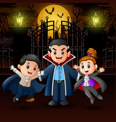 Vampire Family In The Halloween Outdoors At Ni