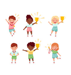 Cute Little Kids Athletes Holding Trophy Cups