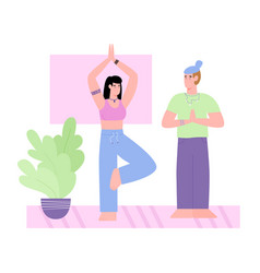 Couple Doing Yoga Poses And Exercises At Home