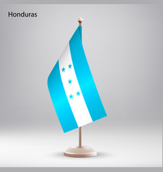 Flag Of Honduras Hanging On A Stand