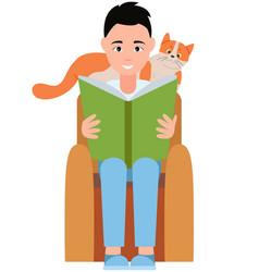 Young Man Reading Book On Armchair With Pet