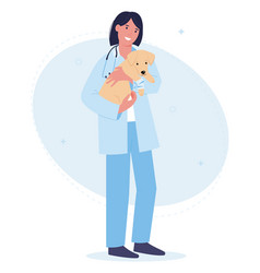 Smiling Female Vet Holding A Dog In Her Arms