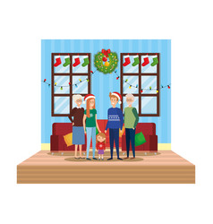 Family In Livingroom With Christmas Decoration