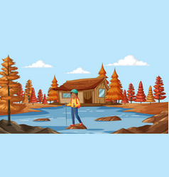 Person Standing On A Pier Near A Wooden Cabin