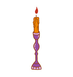 Burning Orange Candle In Antique Candlestick