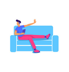 Carefree Guy With Tablet Sitting On Sofa Semi