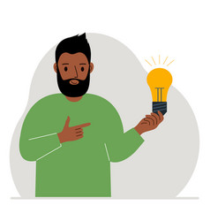 A Man Holds Light Bulb In His Hand Idea Concept