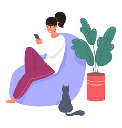 Young Woman Sitting On Lazy Chair Withsmartphone