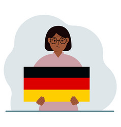 A Woman Holds German Flag In His Hands