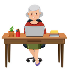 Old Woman Sitting In Front Of Laptop