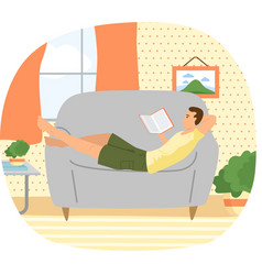 Teen Boy Lying Relax On Couch And Reading