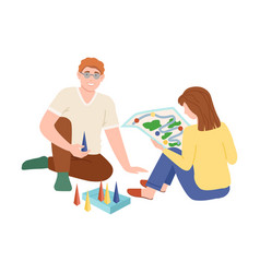 Family Couple Playing Board Game Together At Home