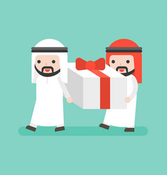 Two Arab Businessman Carrying Big Present Box