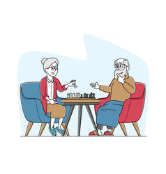 Senior Man And Woman Playing Chess In Nursing Home