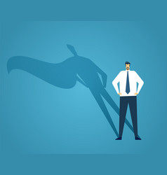 Businessman Standing With Superhero Shadow