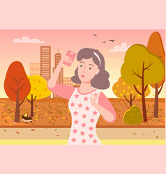 Woman Taking Selfie In Autumn Park On Phone