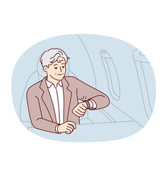 Mature Rich Man Look At Clock Sitting In Plane