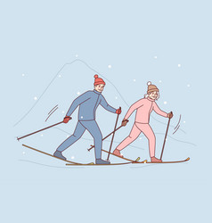 Couple Enjoy Skiing In Mountains