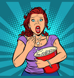 Woman Watching A Scary Movie And Eating Popcorn