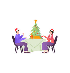 A Couple Is Having Dinner On Christmas