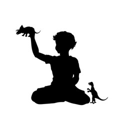 Kid Plays Dinosaur Silhouette Of Sitting Boy