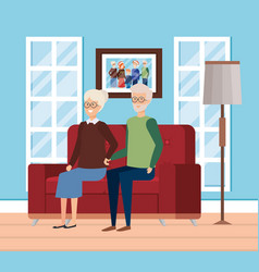 Grandparents In Livingroom With Winter Clothes