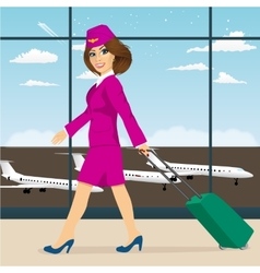 Stewardess Walking Through Airport Terminal