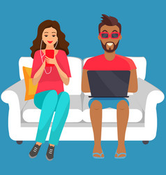 People On Comfortable Couch With Electronic