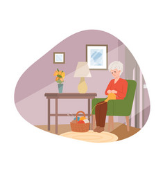 Elderly Woman Sitting In Chair And Knitting