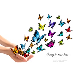 Hands Releasing Colorful Butterflies