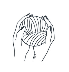 Female Hands Holding A Ball Of Thread For Knitting