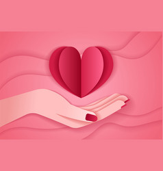 Female Hand Holding A Red Paper Heart