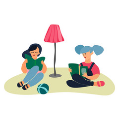 Girls Reading Books By A Floor-lamp