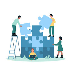 Team Building Tiny People Connect Puzzle Pieces