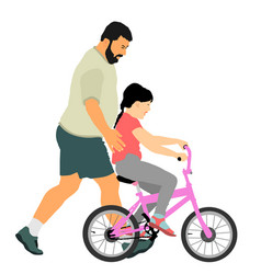 Father Teaching His Daughter Riding A Bicycle