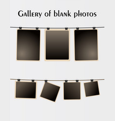 Blank Photos Hanging On A Wire Rope