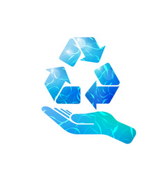 A Hand Lift Up The Recycling Symbol