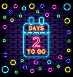 2 Days To Go Badge In Neon Style On Brick Wall