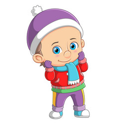 Cute Boy Wearing Red Winter Coat And Purple Hat