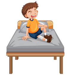 A Boy With Injure Leg Crying On The Bed