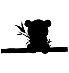 Silhouette Of Panda Bear Cub Sits On Bamboo Trunk