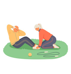 Senior Woman Helping Man To Do Abdominal Exercises