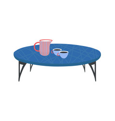 Blue Coffee Table With Striped Jug And Two Cups