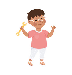 Cute Little Boy In Glasses Holding Wrench