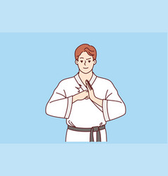 Man Fighter In Karate Or Taekwondo Clothes Makes