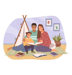 Happy Family Sitting On Floor And Reading Book