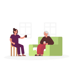 Old Lady Sitting On Sofa Nurse Sitting Near