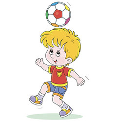 Little Football Player Juggling A Ball